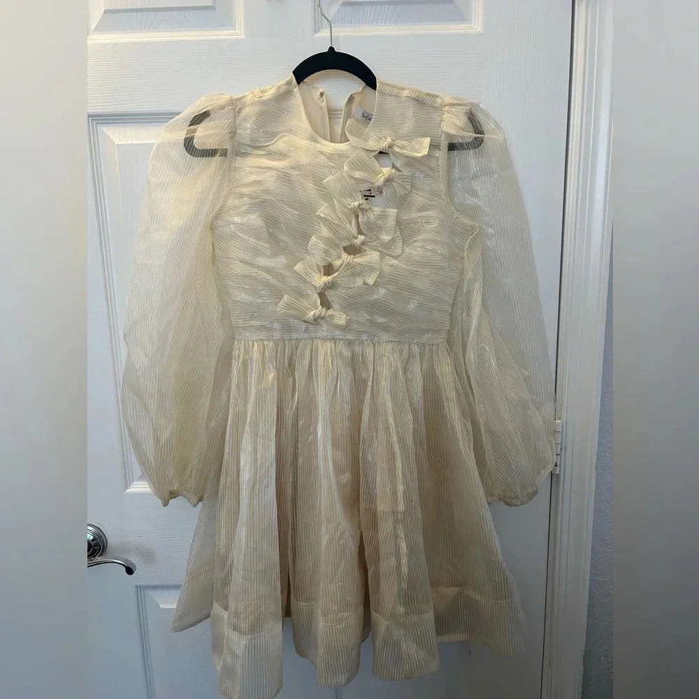 Gold bow front mini dress. Sofie the Label - Picture 4 of 6